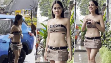 Urfi Javed Picks a Belted Themed Skimpy Outfit for Her Outing on Rainy Day (Watch Video)